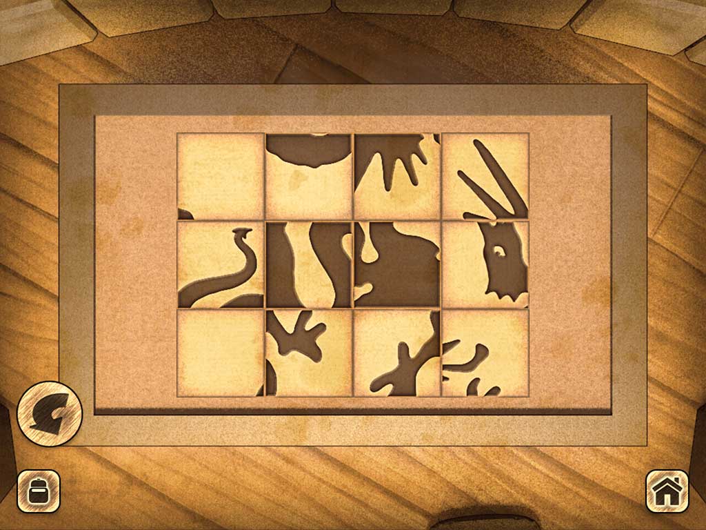 A sliding-tile puzzle on a wooden board, its pieces forming the silhouette of a horned creature